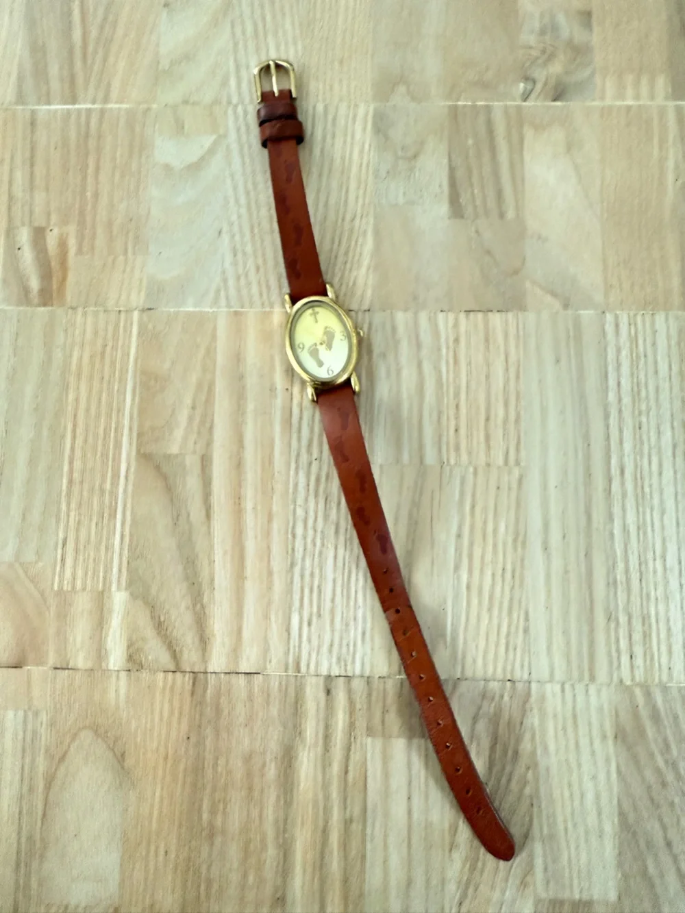 Avon Christian theme footprints oval brown leather watch NEW BATTERY